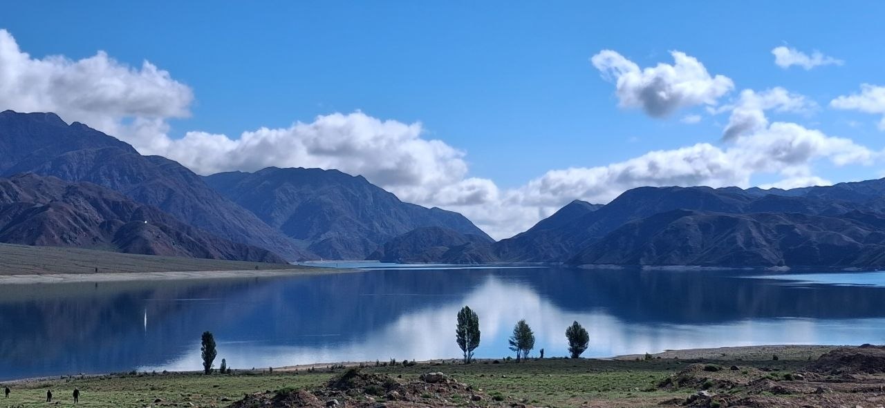 Snow-capped mountains and lake in Kyrgyzstan