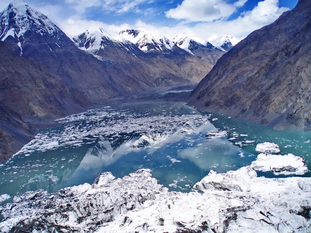 Merzbacher glacial lake with Khan Tengri peak and Engilchek glacier in background